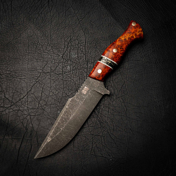 N690 Hunter – Red Amboyna Burl & Black TruStone