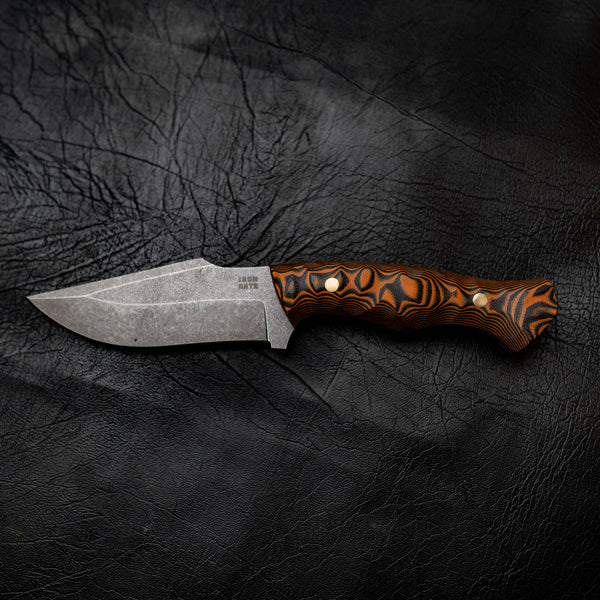 Wide Hunter — Orange & Black Layered G10, Rock Face