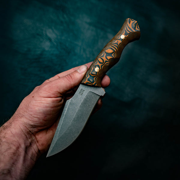 Wide Hunter — Orange & Black Layered G10, Rock Face