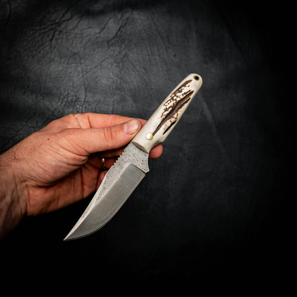 Fallow Antler Scout N690 — in-hand for scale