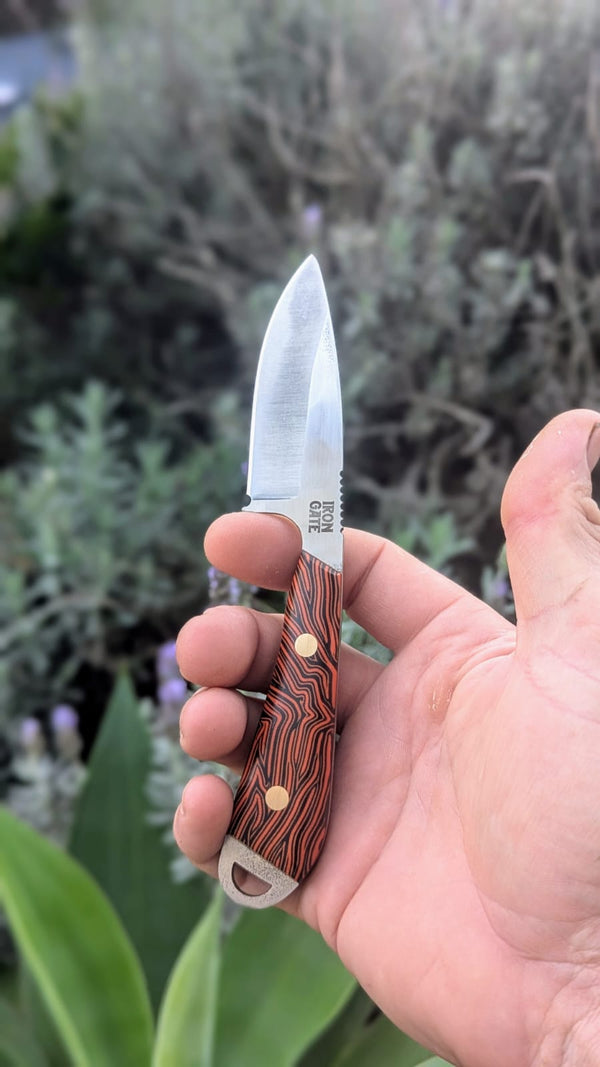 Ergo Skinner with Orange Damascus G10 Handle
