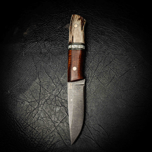 N690 Bushcraft – Fallow Deer Antler, White TruStone & Ringed Gidgee