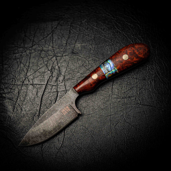 N690 Ergo Skinner – Rosewood with Abalone Inlay