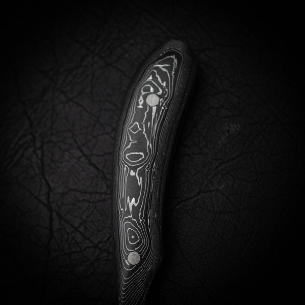 Ergo Skinner – Damascus Steel with Aluminium Foil Carbon Fiber