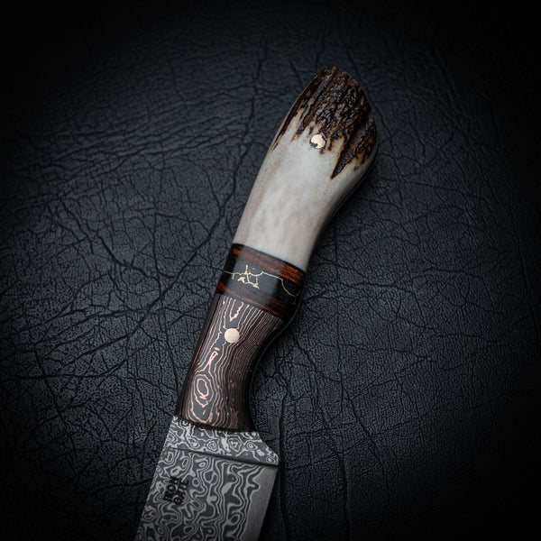 Drop Point Hunter – Damascus Steel with Copper Carbon Fiber, Ironwood, Trustone & Antler