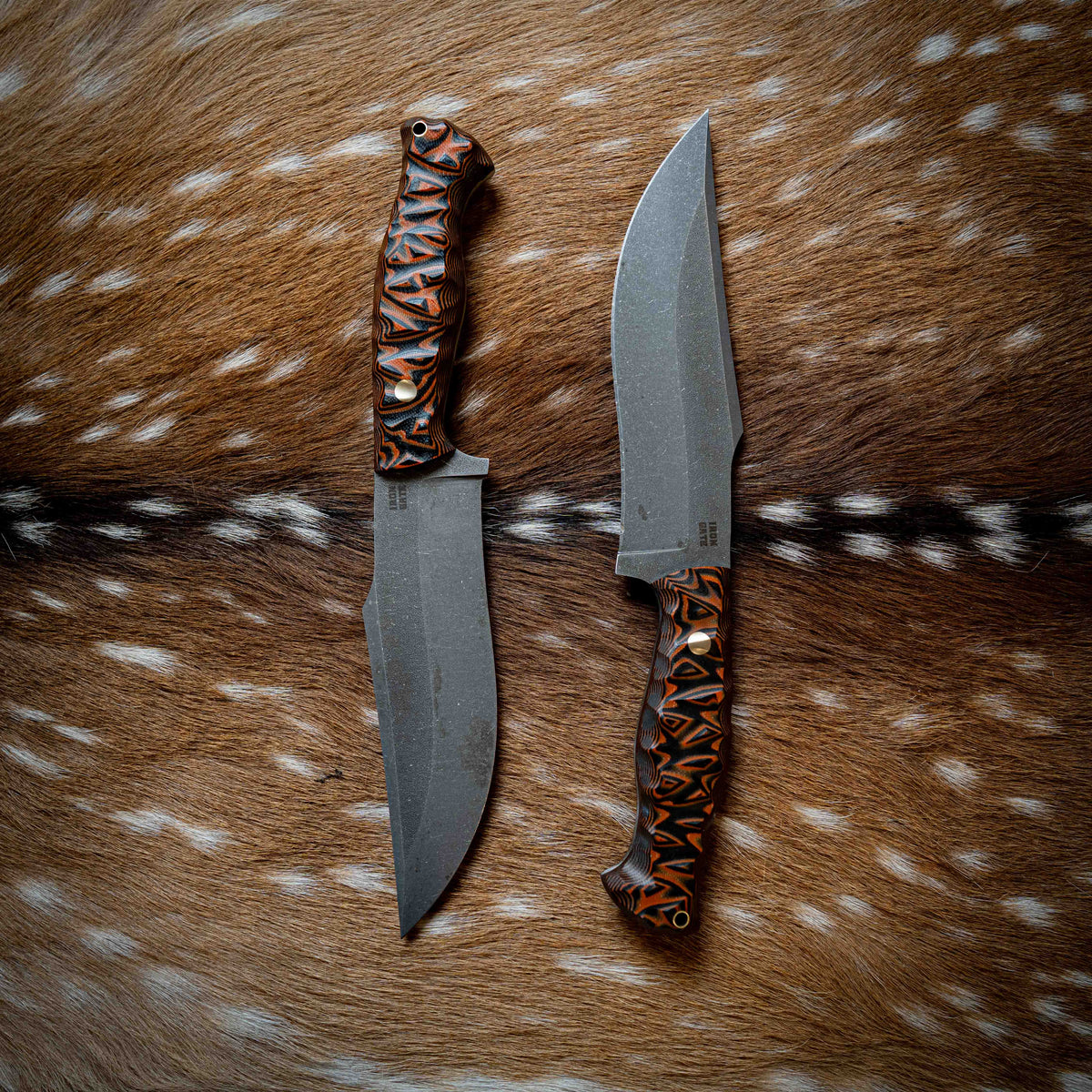 Large Hunter — Black & Orange Layered G10, Rock Face