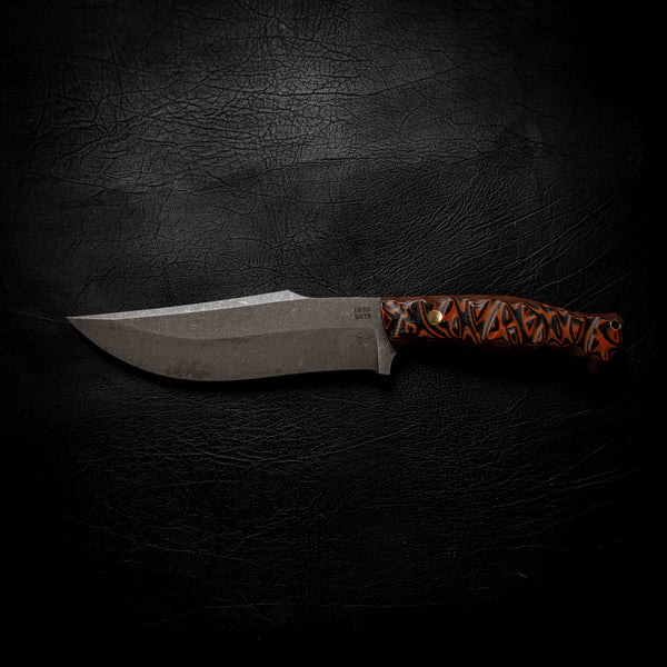 Large Hunter — Black & Orange Layered G10, Rock Face