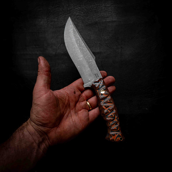 Large Hunter — Black & Orange Layered G10, Rock Face