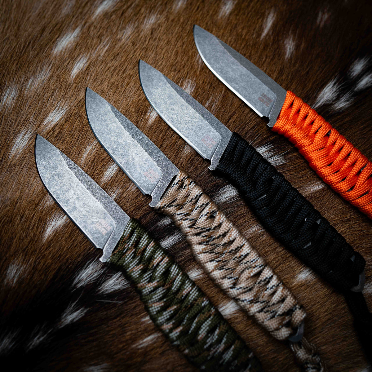 Handmade Iron Gate knives on a black background