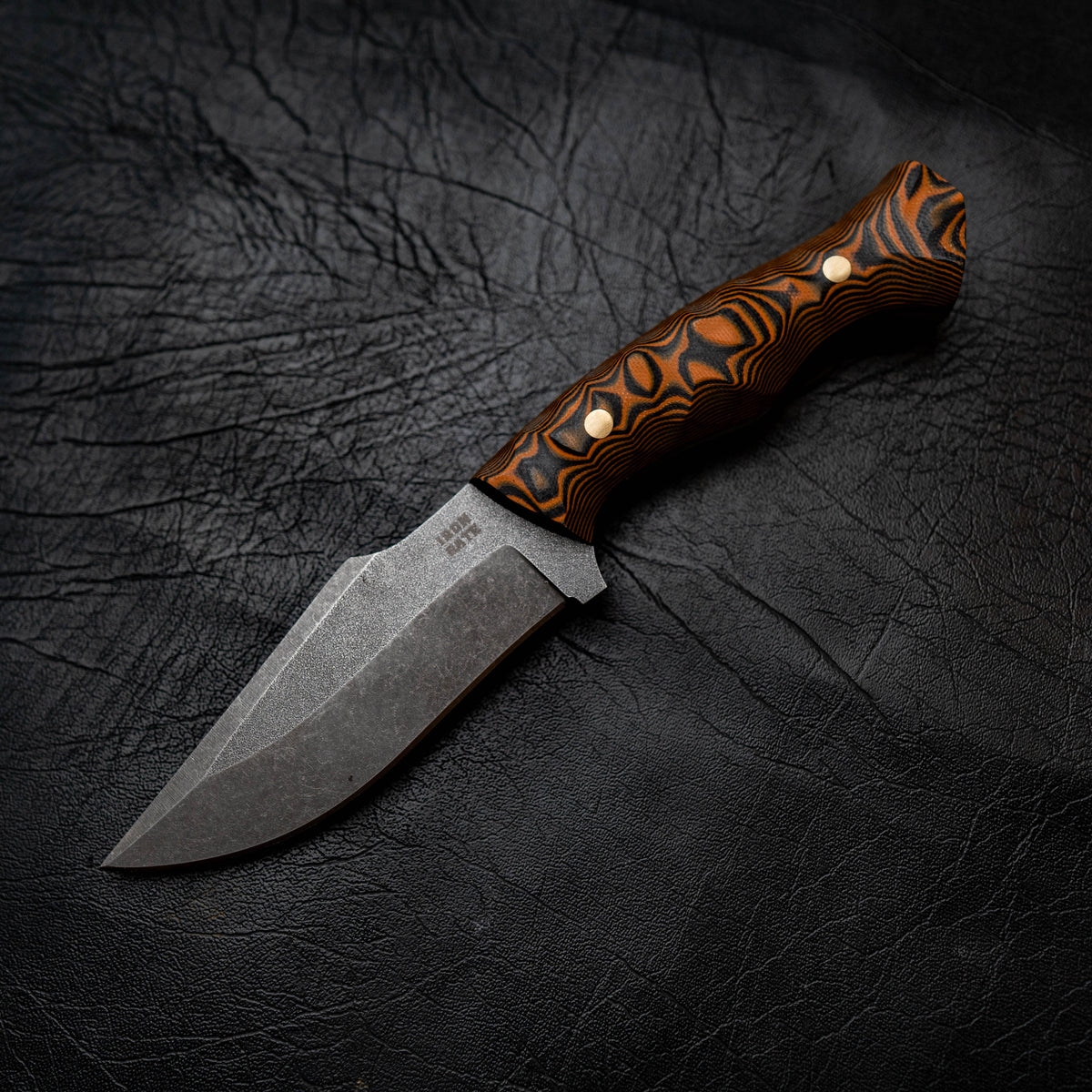 Wide Hunter — Orange & Black Layered G10, Rock Face
