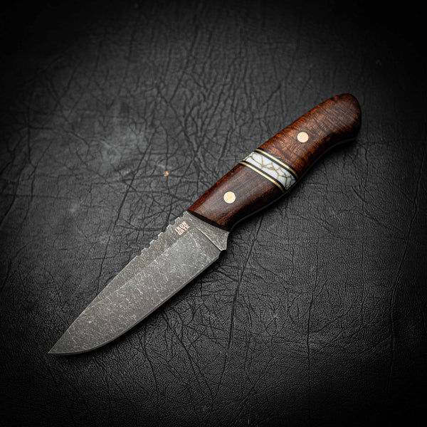 Bushcraft – N690 Stonewashed | Ringed Gidgee, White & Brass Spacer